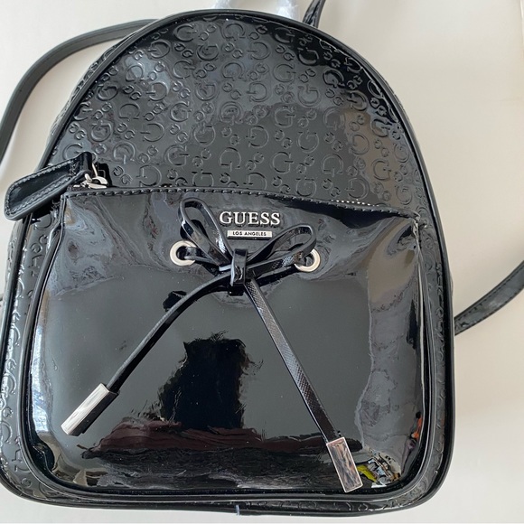 Guess Handbags - NWOT Guess Mini Backpack